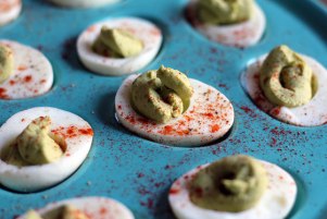 these-avocado-deviled-eggs-with-smoked-paprika-are-super-nutritious-make-them-as-a-snack-or-an-appetizer-incredibleeggs-ad-howdoyoulikeyoureggs-eggs-recipe-eggrecipe-deviledeggs-appetize